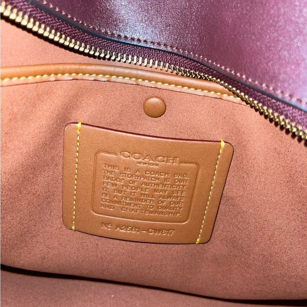 Coach 48 Merlot Empire has seen some world! Too big of a bag for me! - Picture 5 of 10